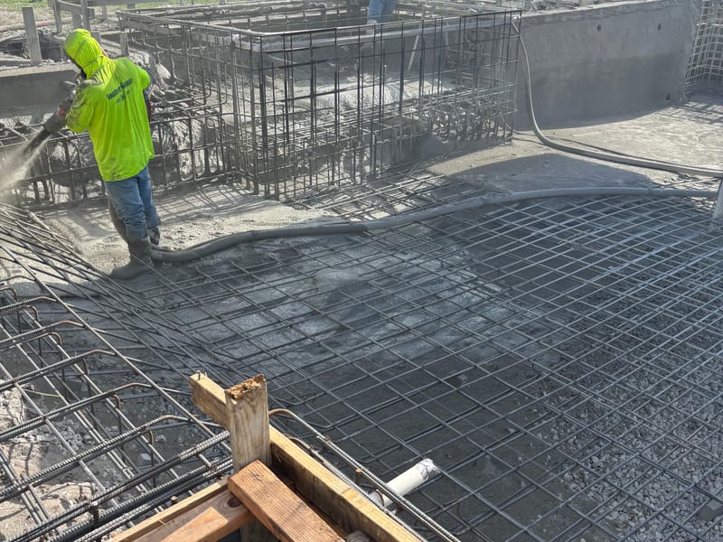 Southern Gunite team members working together on a construction project